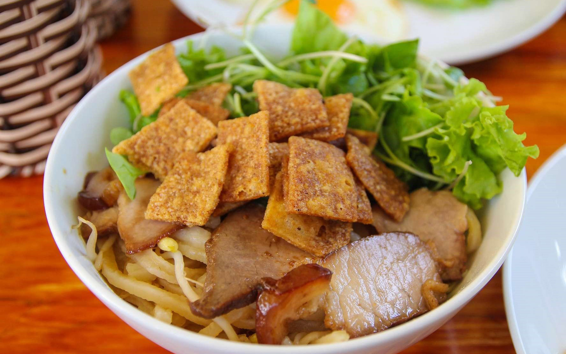 Cao Lầu, Hoi An's signature noodle dish with pork and greens